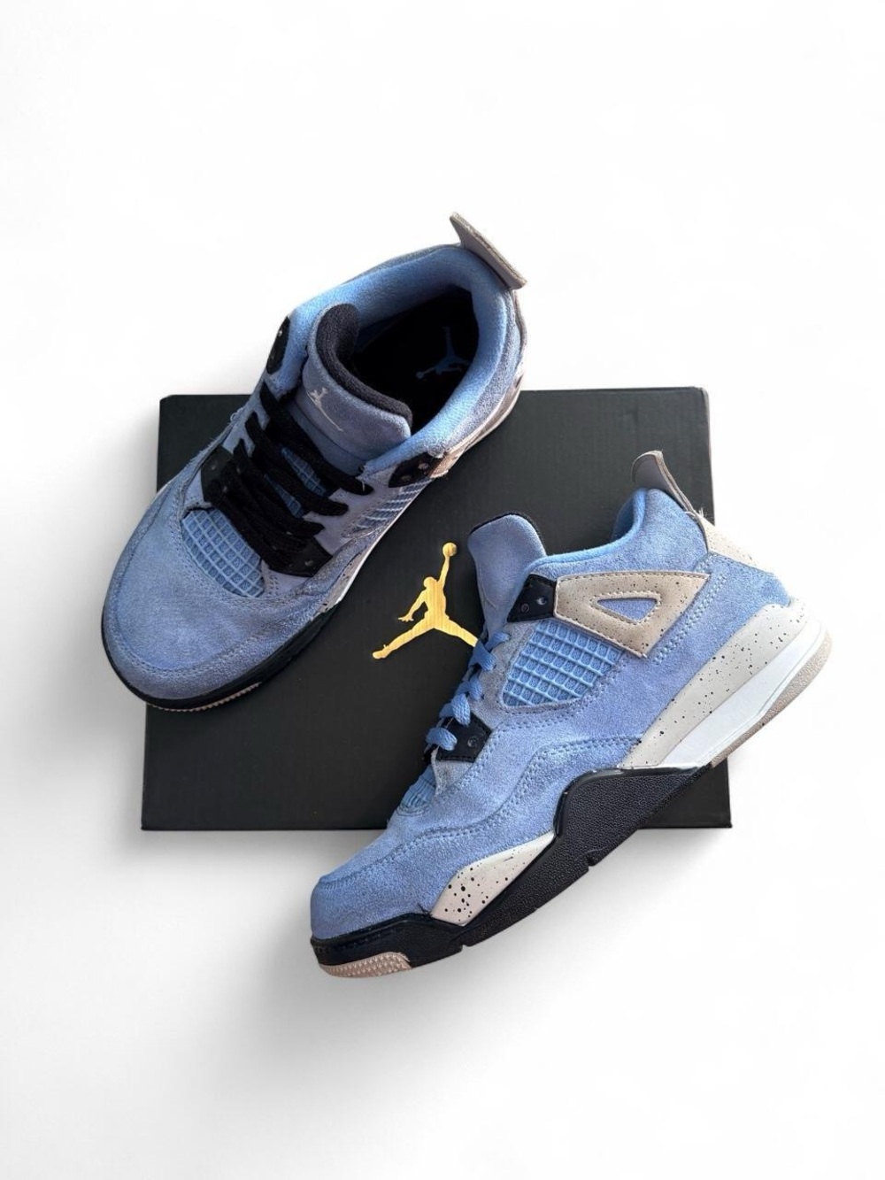 Air Jordan 4 Retro “University Blue” – Youth 2Y